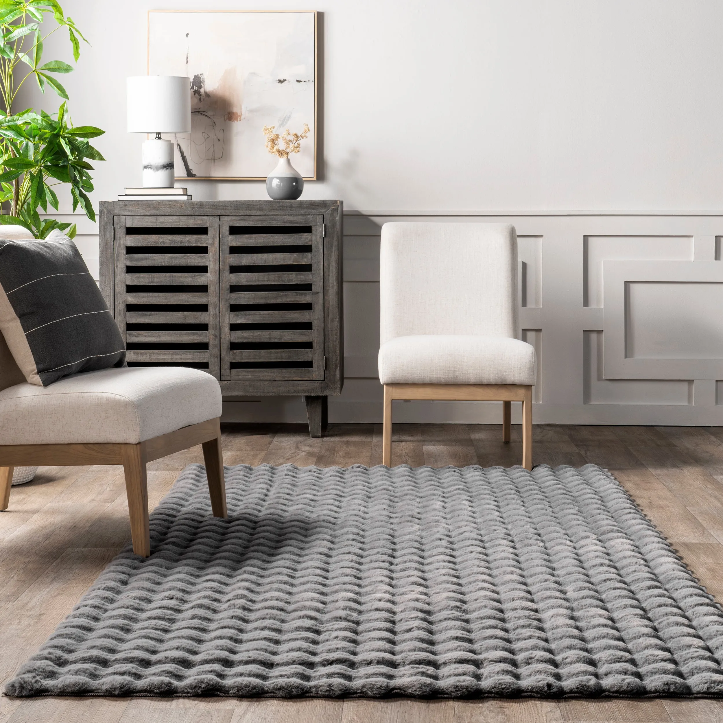 Jeni Solid Faux Rabbit Machine Washable Area Rug
