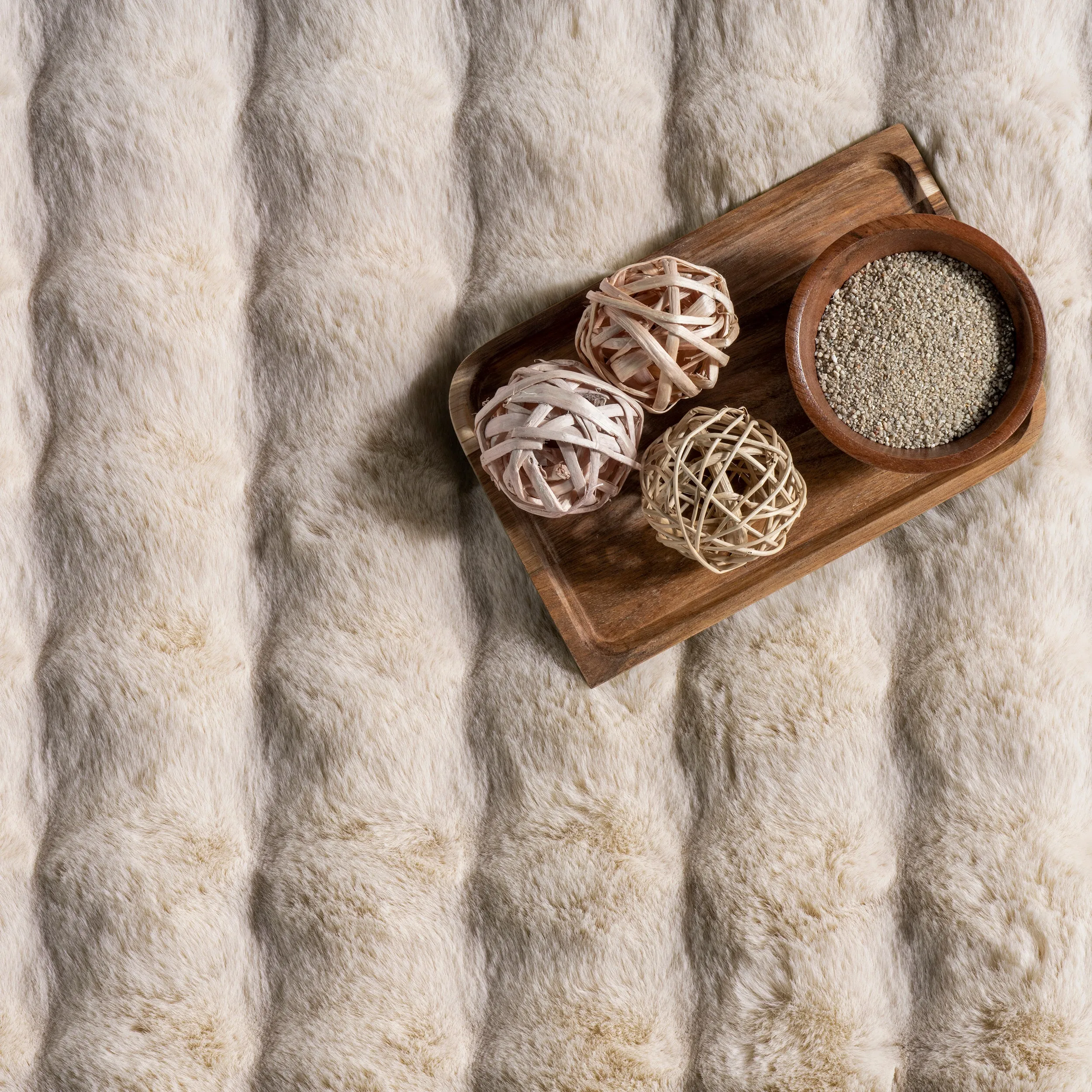 Jeni Solid Faux Rabbit Machine Washable Area Rug