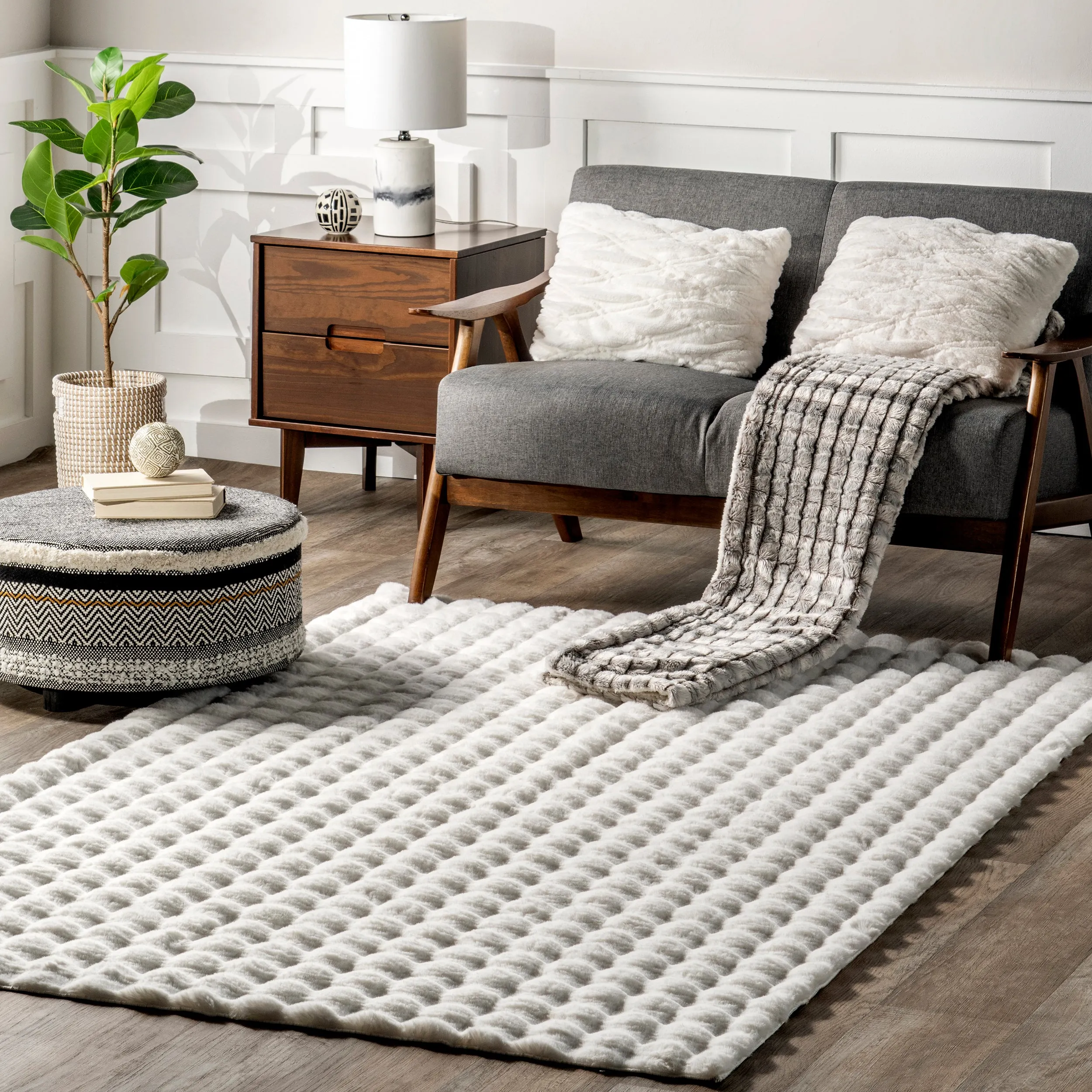 Jeni Solid Faux Rabbit Machine Washable Area Rug