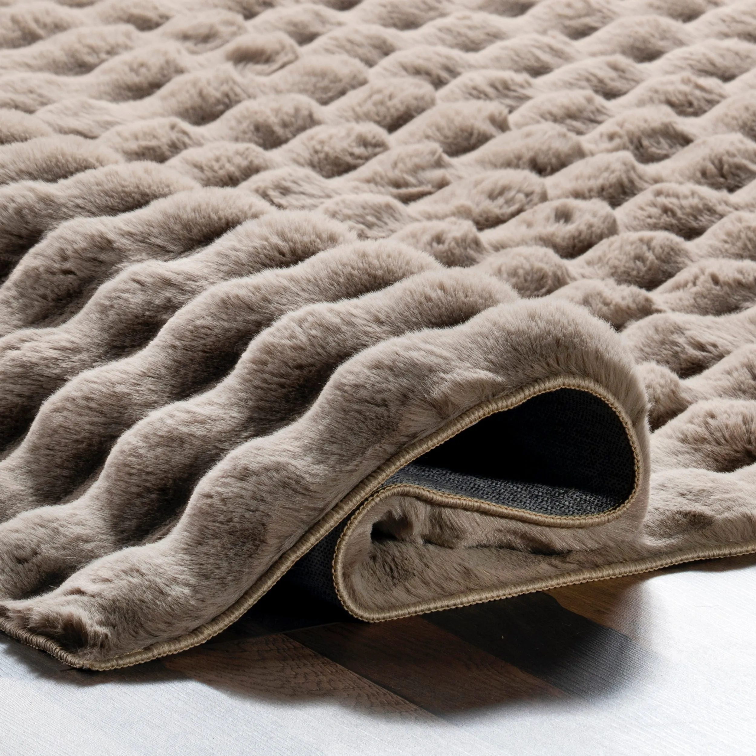 Jeni Solid Faux Rabbit Machine Washable Area Rug