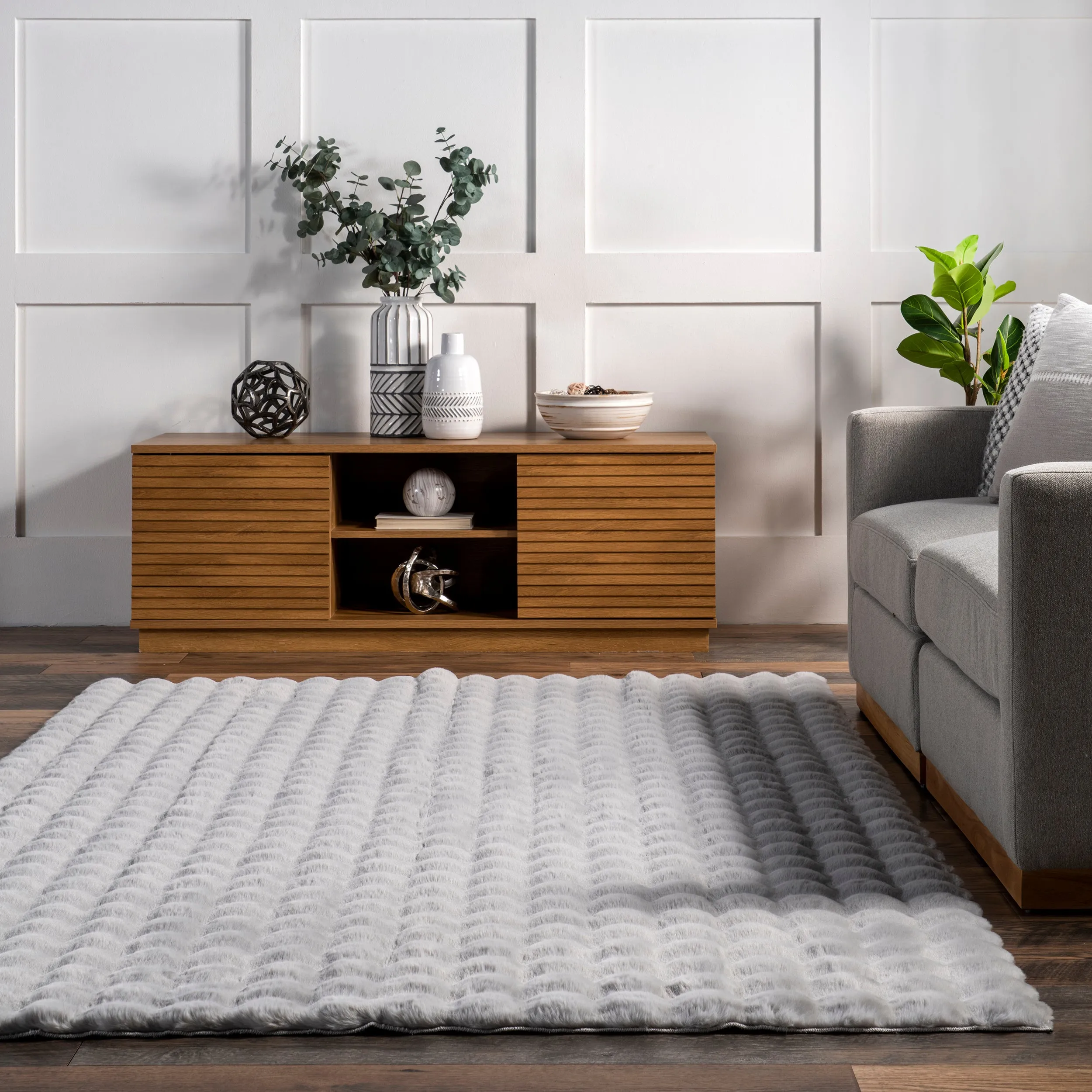 Jeni Solid Faux Rabbit Machine Washable Area Rug