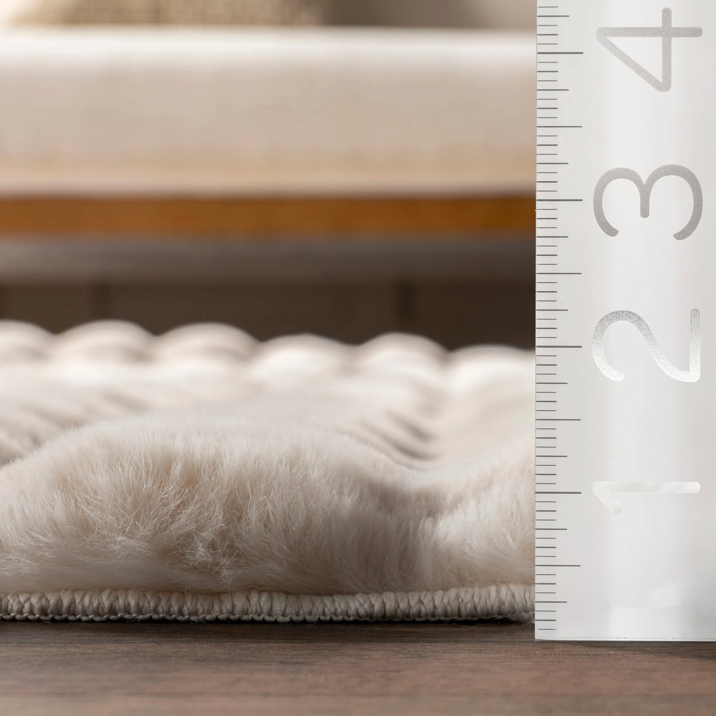 Jeni Solid Faux Rabbit Machine Washable Area Rug