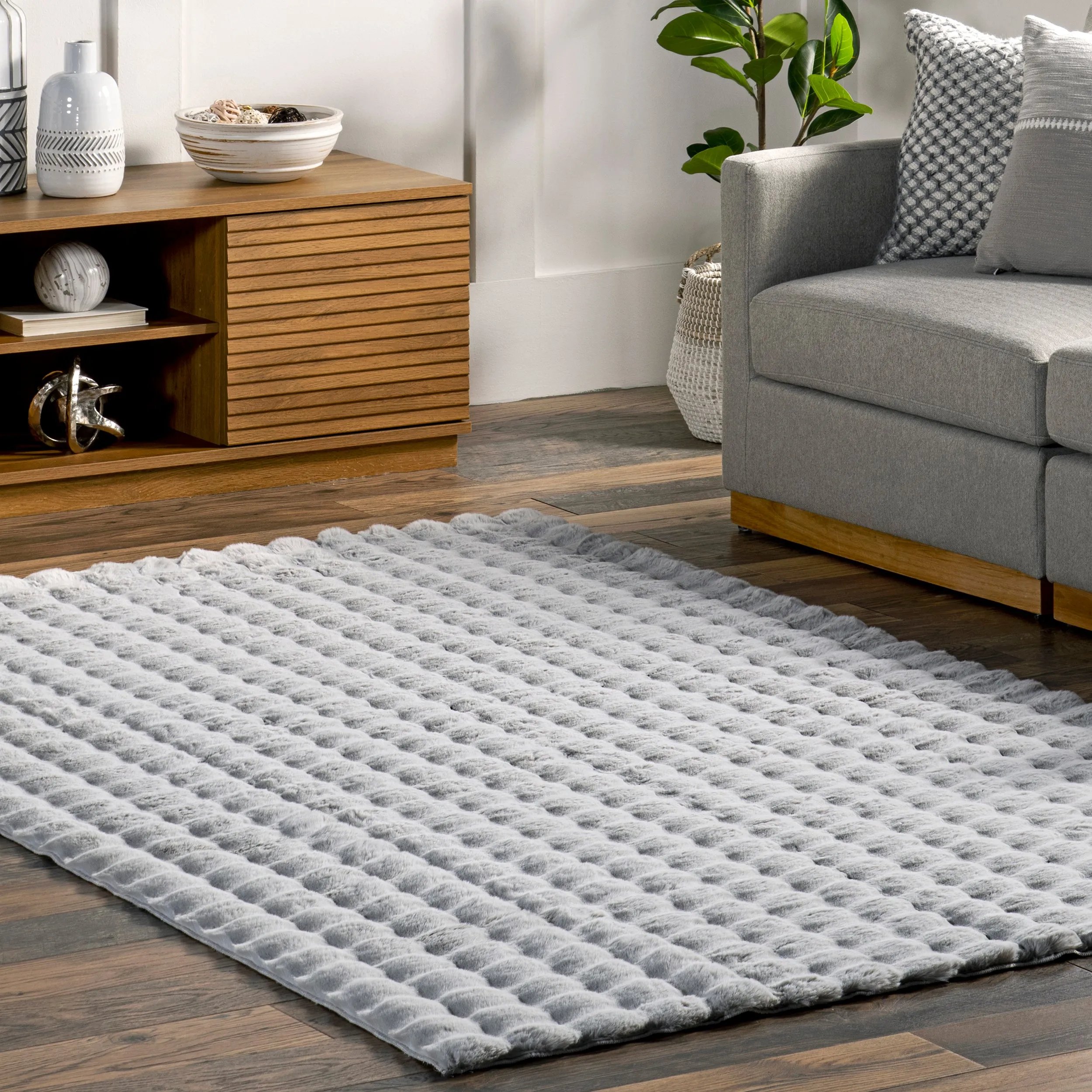Jeni Solid Faux Rabbit Machine Washable Area Rug