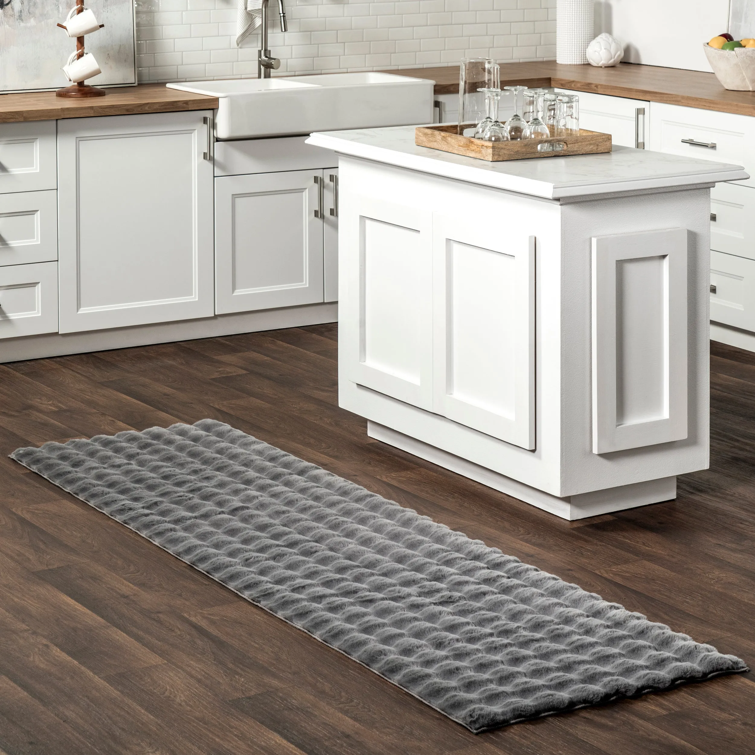 Jeni Solid Faux Rabbit Machine Washable Area Rug
