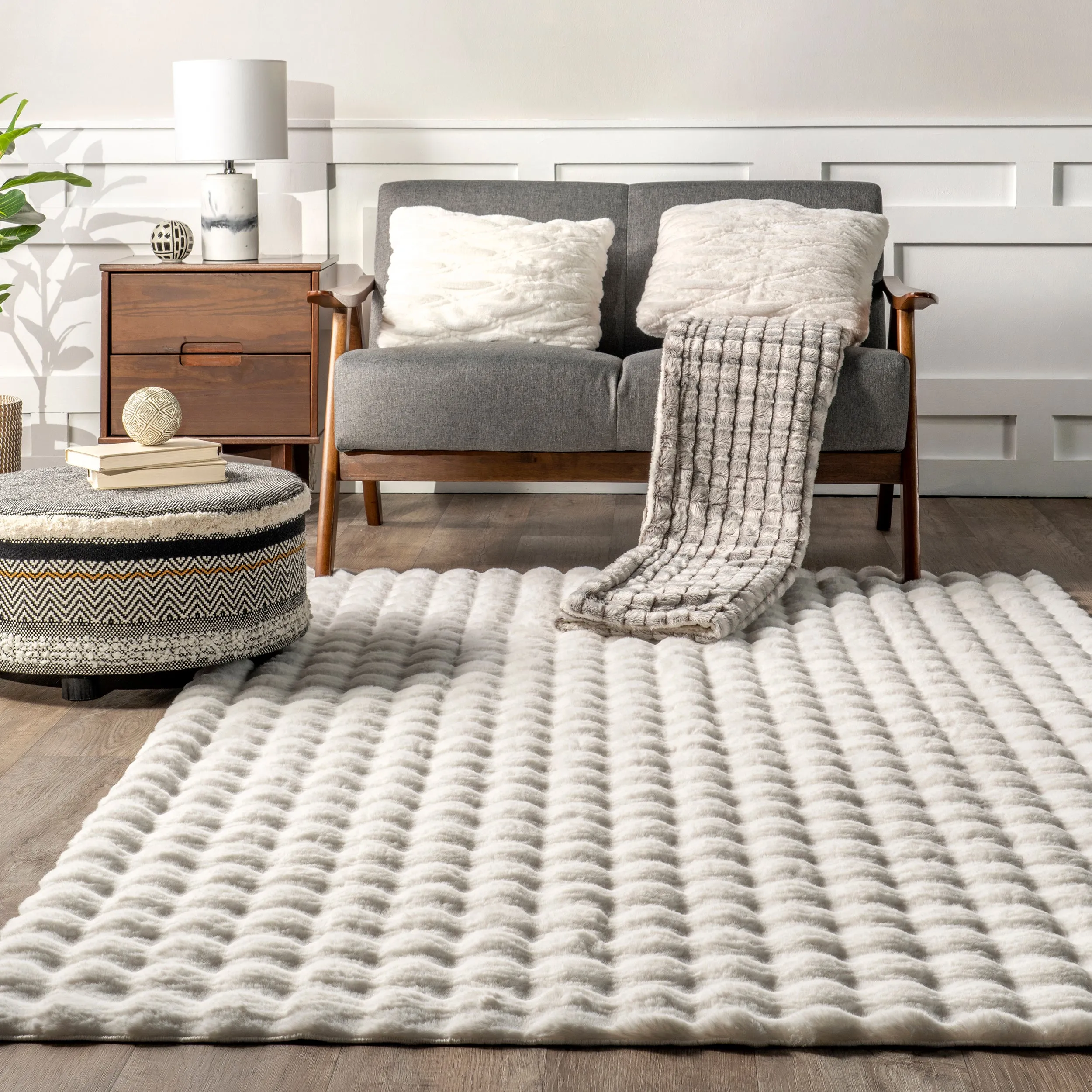 Jeni Solid Faux Rabbit Machine Washable Area Rug
