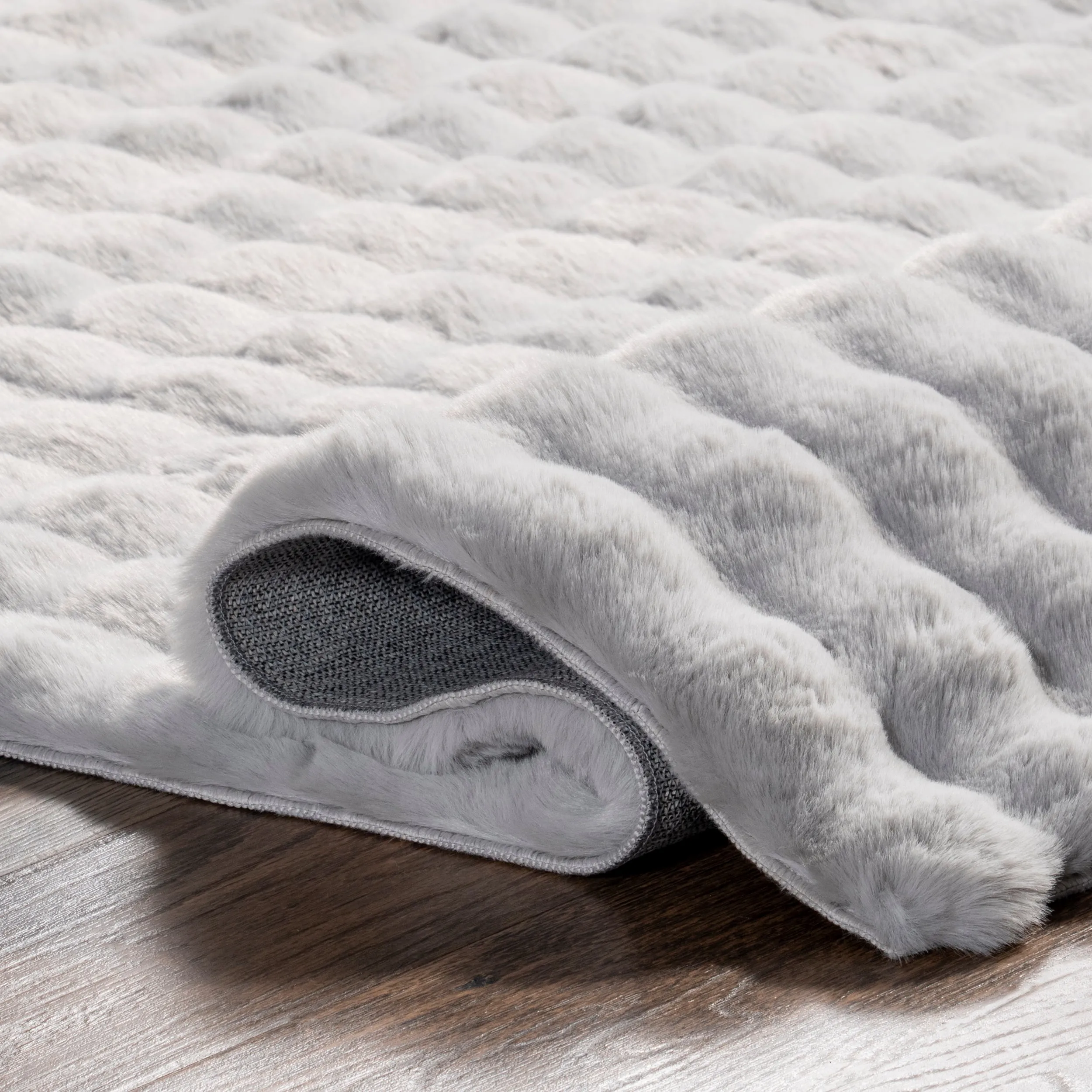 Jeni Solid Faux Rabbit Machine Washable Area Rug