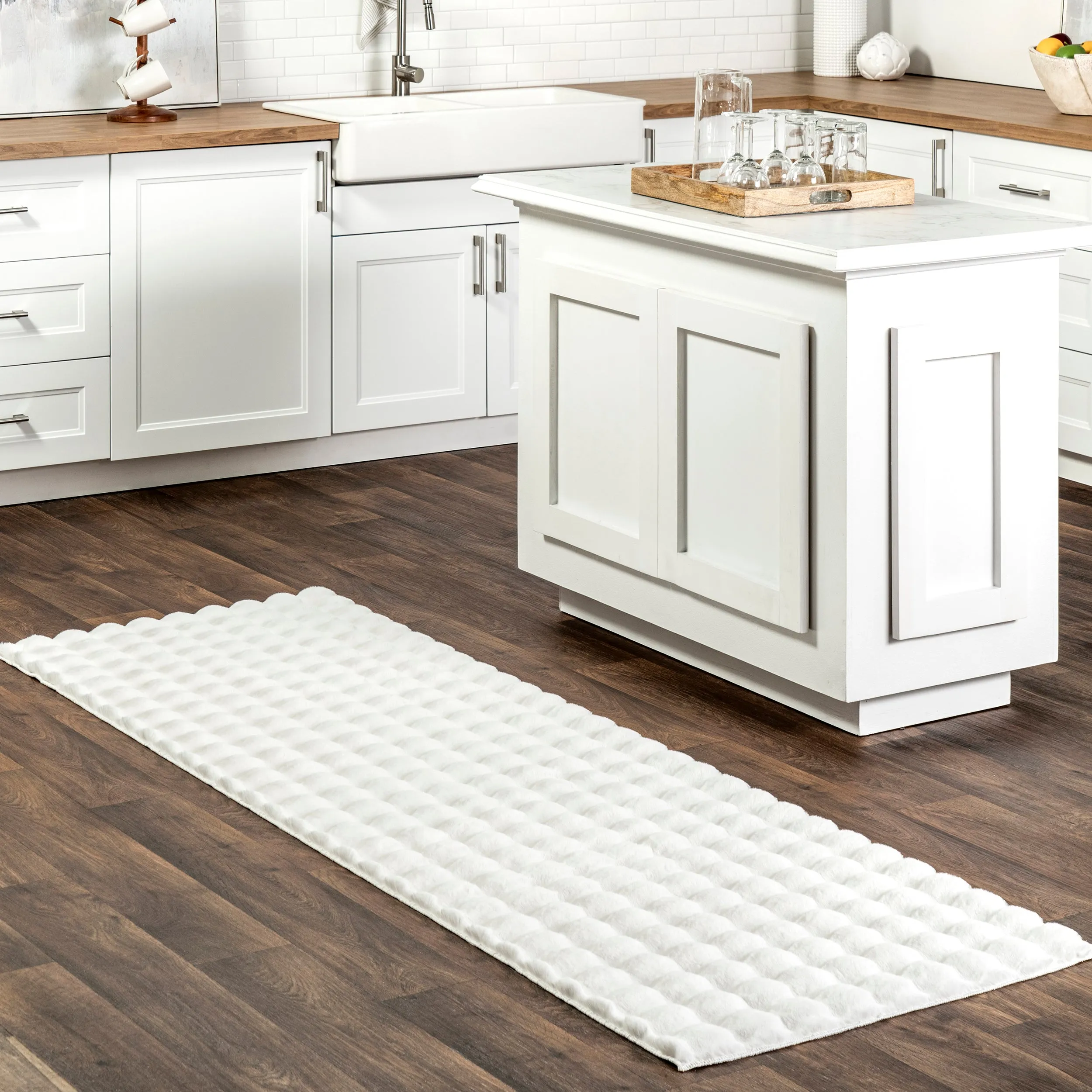 Jeni Solid Faux Rabbit Machine Washable Area Rug
