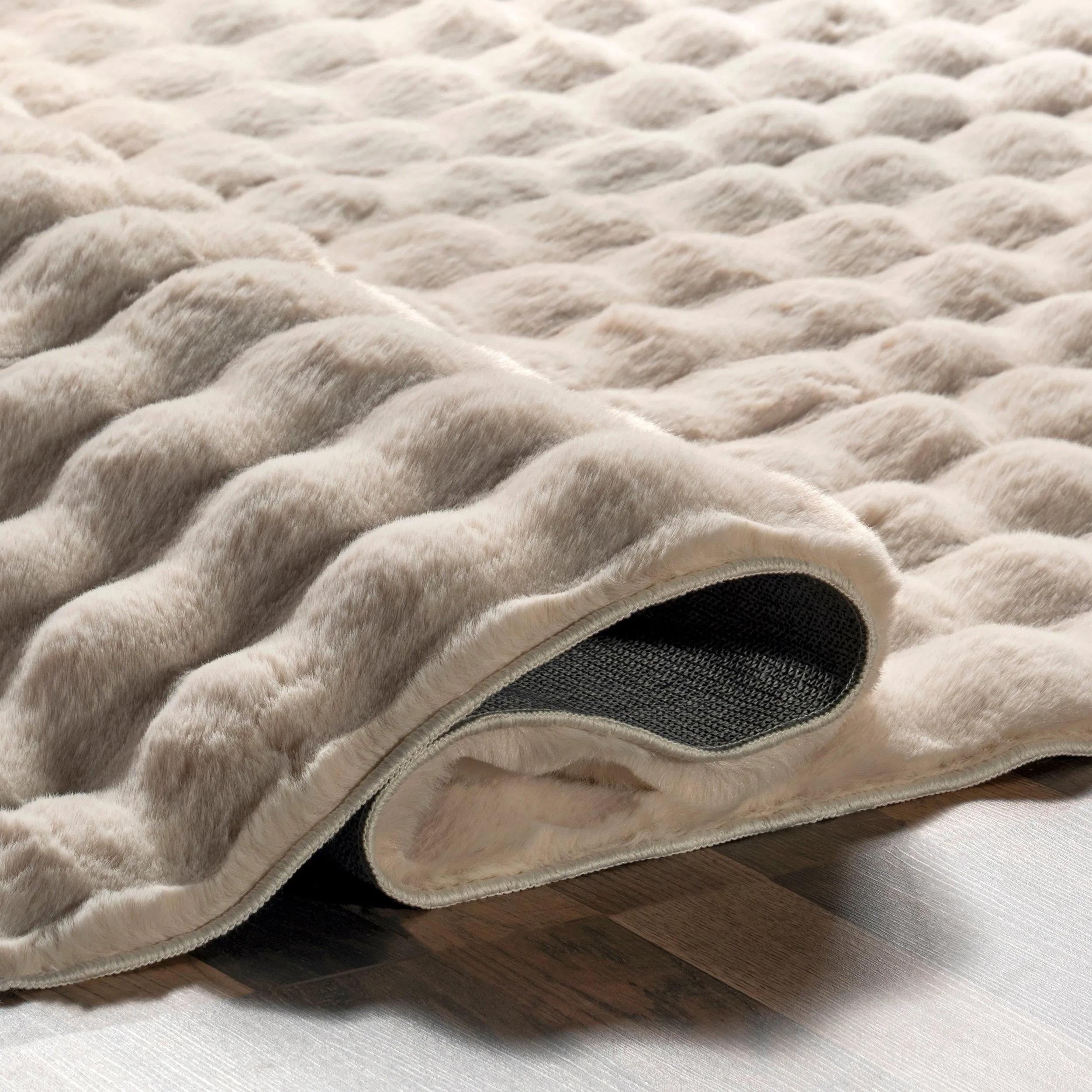 Jeni Solid Faux Rabbit Machine Washable Area Rug