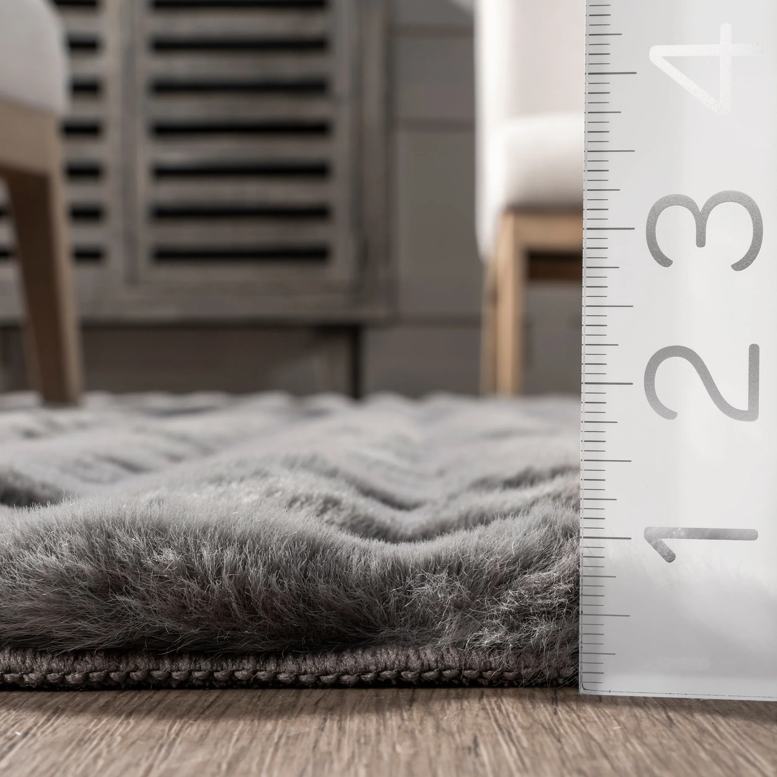 Jeni Solid Faux Rabbit Machine Washable Area Rug