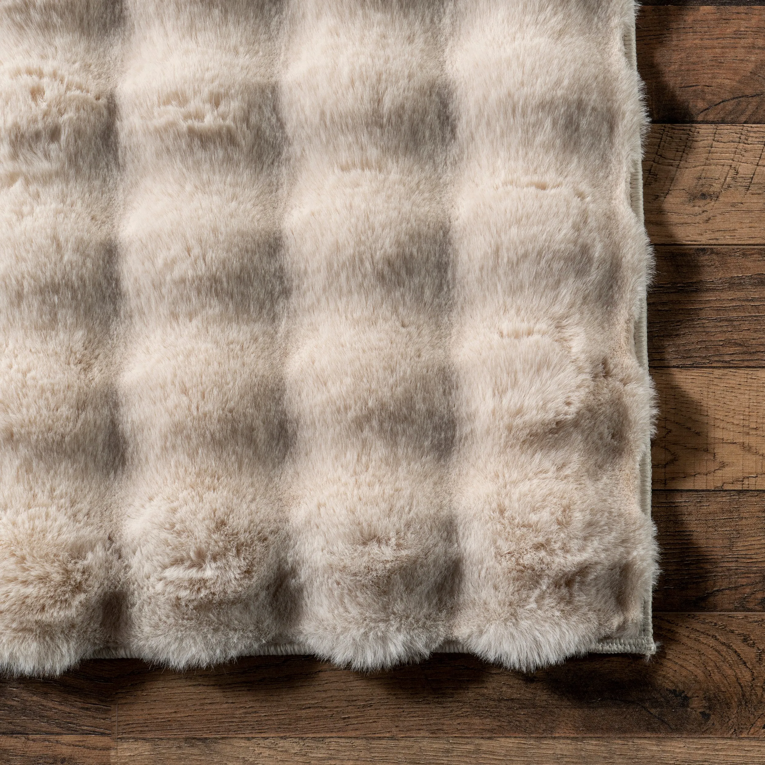 Jeni Solid Faux Rabbit Machine Washable Area Rug