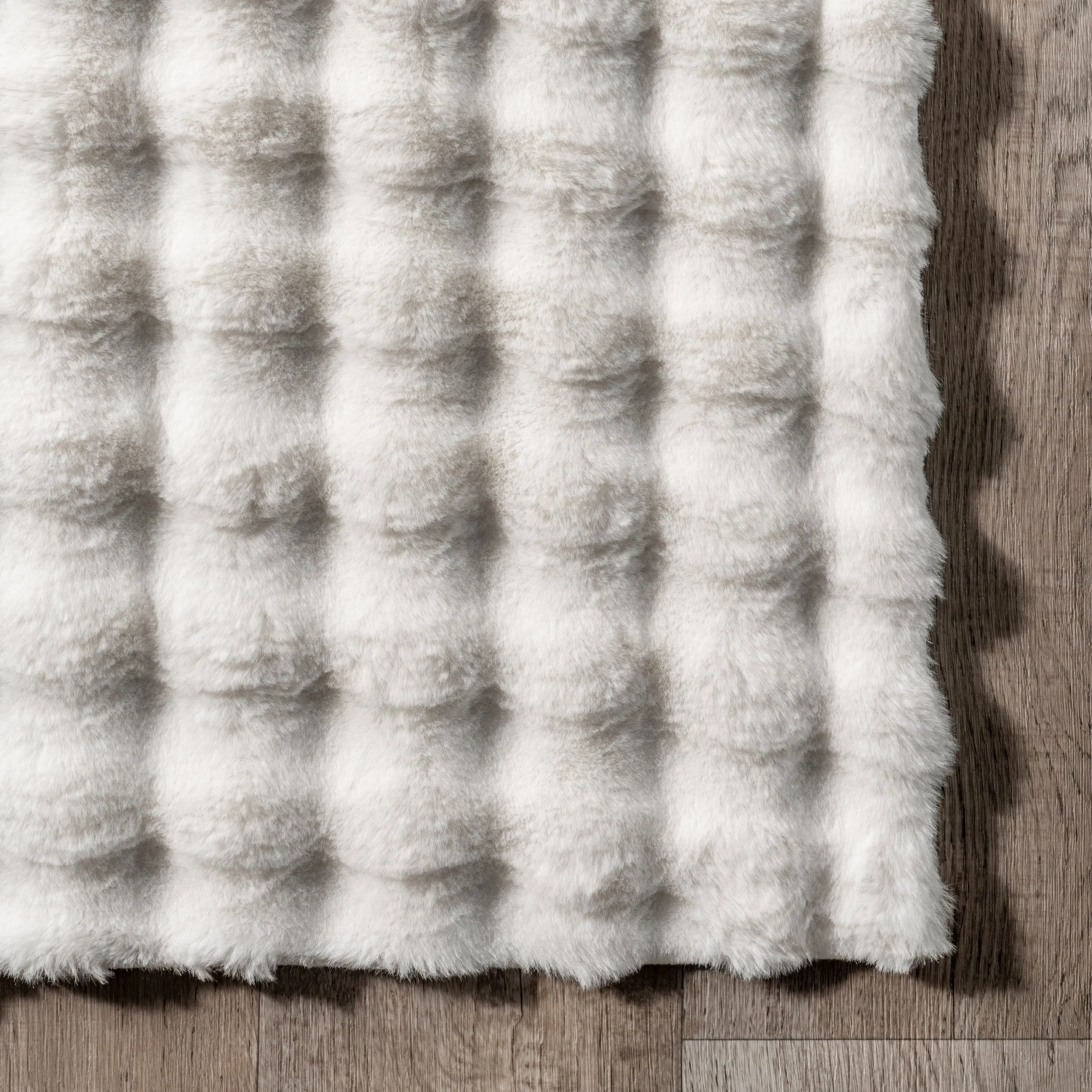 Jeni Solid Faux Rabbit Machine Washable Area Rug